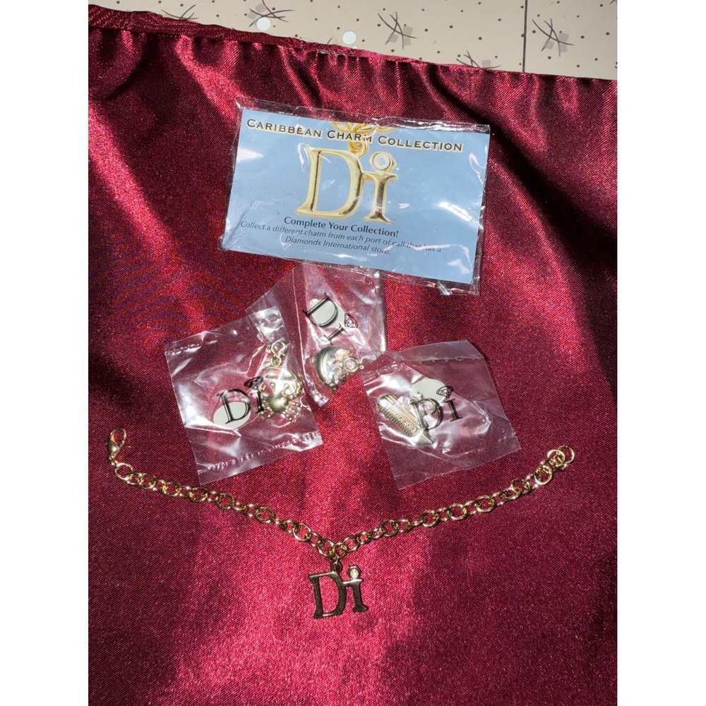 Diamonds International Caribbean Charm Collection Gold Tone Bracelet & 3 Charms